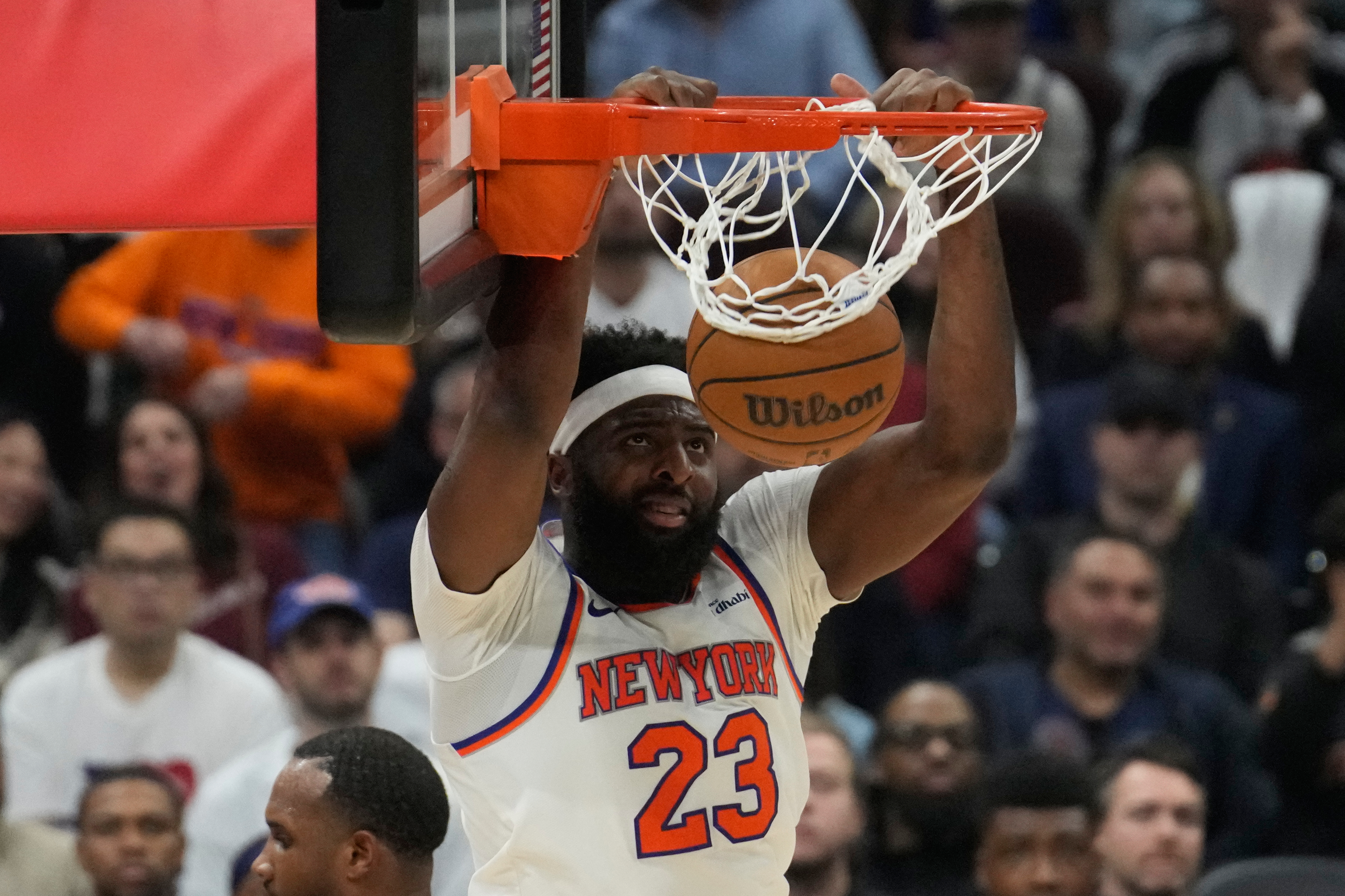 New York Knicks center Mitchell Robinson dunks during the second half of Game 4 in the Eastern Conference finals NBA basketball playoffs series against the Cleveland Cavaliers in Cleveland, Monday, May 25, 2026. 