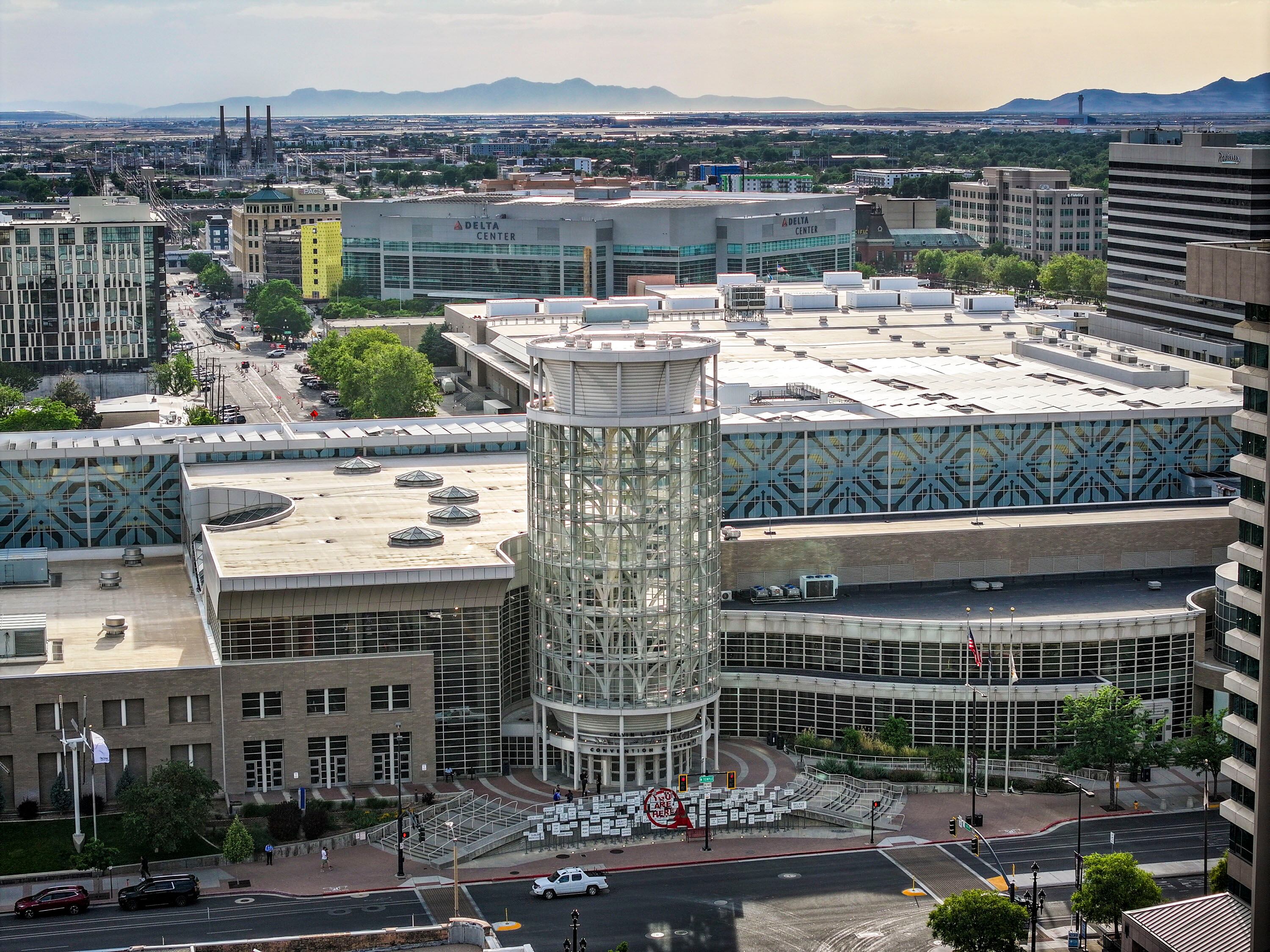 The Salt Palace Convention Center and the Delta Center stand among other buildings in downtown Salt Lake City on Tuesday. Cash is beginning to flow from a sales tax increase to fund a planned sports and entertainment district in downtown.