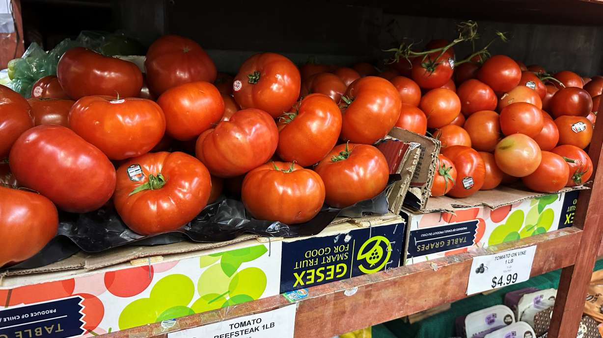 Tomatoes await customers on the shelves of a supermarket in New York on Tuesday.