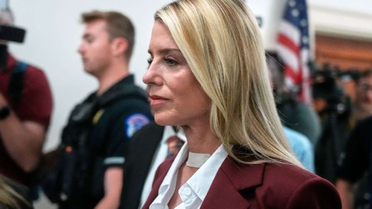 Former Attorney General Pam Bondi arrives for her deposition at the Rayburn House Office Building on Capitol Hill on Friday in Washington.