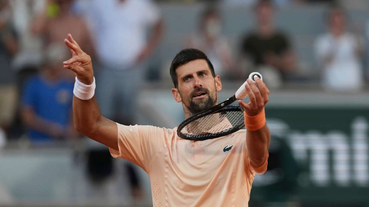Novak Djokovic of Serbia celebrates after winning against Valentin Royer of France during their second round men's singles tennis match at the French Open tennis tournament in Paris, Wednesday, May 27, 2026.