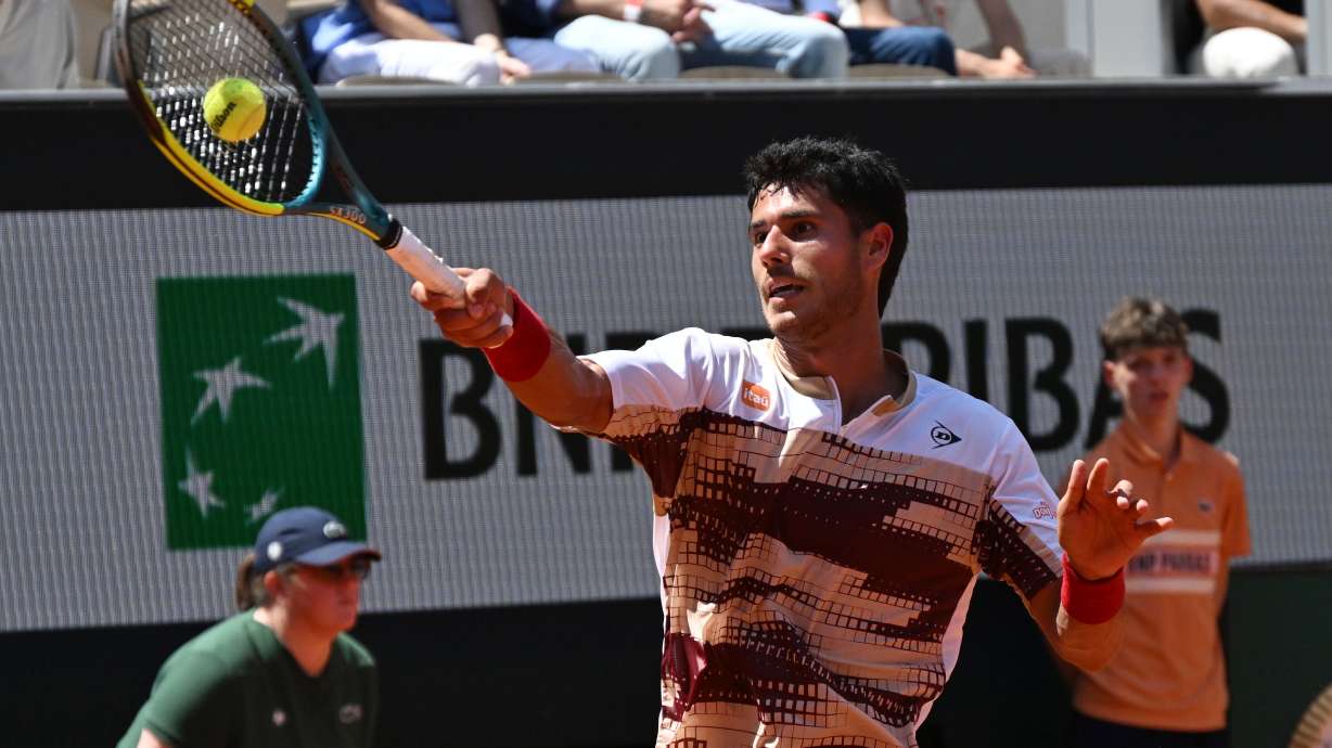 Adolfo Daniel Vallejo of Paraguay returns to Moise Kouame of France during their second round men's singles tennis match at the French Open tennis tournament in Paris, Thursday, May 28, 2026.