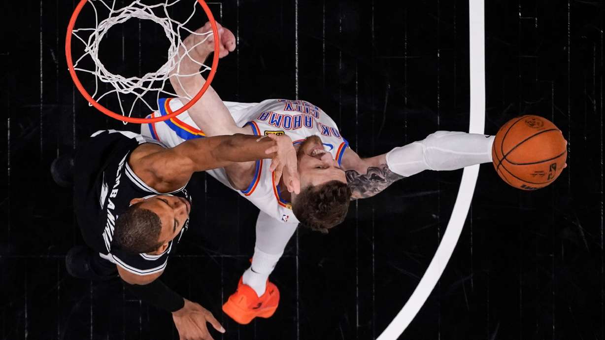 Oklahoma City Thunder center Isaiah Hartenstein (55) shoots against San Antonio Spurs forward Victor Wembanyama (1) in the second half of Game 6 in the Western Conference finals NBA basketball playoffs series, Thursday, May 28, 2026, in San Antonio.