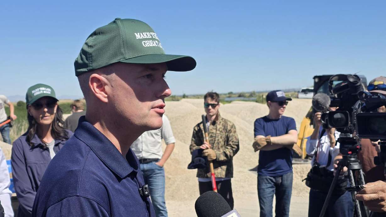 Utah Gov. Spencer Cox speaks with reporters at the George S. and Dolores Doré Eccles Wildlife Education Center in Farmington on Friday. Cox signed a new executive order guiding the development of data centers in the state.