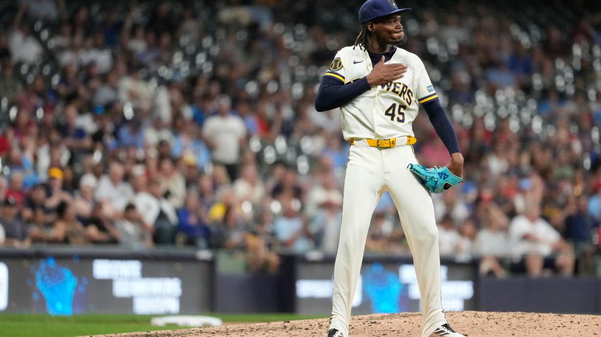 Milwaukee Brewers' Abner Uribe gestures during the eighth inning of a baseball game against the St. Louis Cardinals, Tuesday, May 26, 2026, in Milwaukee.