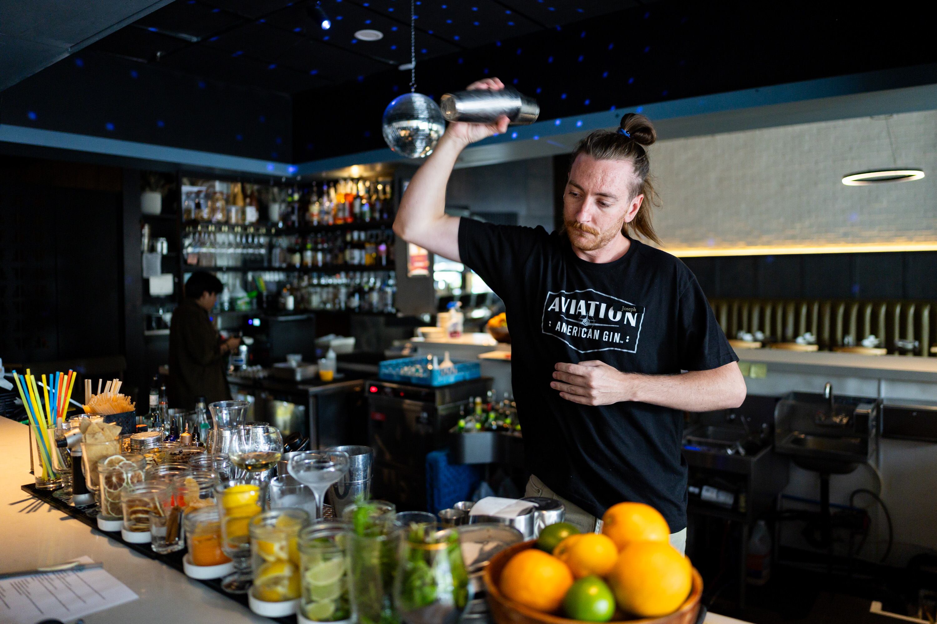 Joseph Butterfield bartends at Felt Bar and Eatery in Salt Lake City on Thursday. Much of the menu at the restaurant is created by the staff themselves.
