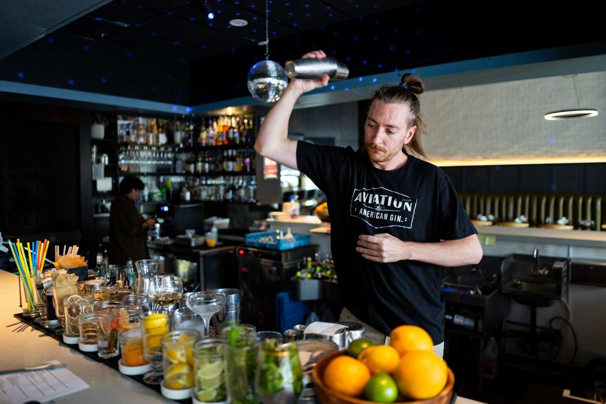 Joseph Butterfield bartends at Felt Bar and Eatery in Salt Lake City on Thursday. Much of the menu at the restaurant is created by the staff themselves.