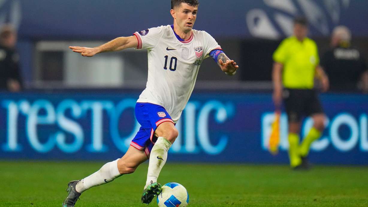 FILE - United States' Christian Pulisic dribbles during a CONCACAF Nations League championship soccer match between Mexico and the United States, Sunday, March 24, 2024, in Arlington, Texas.