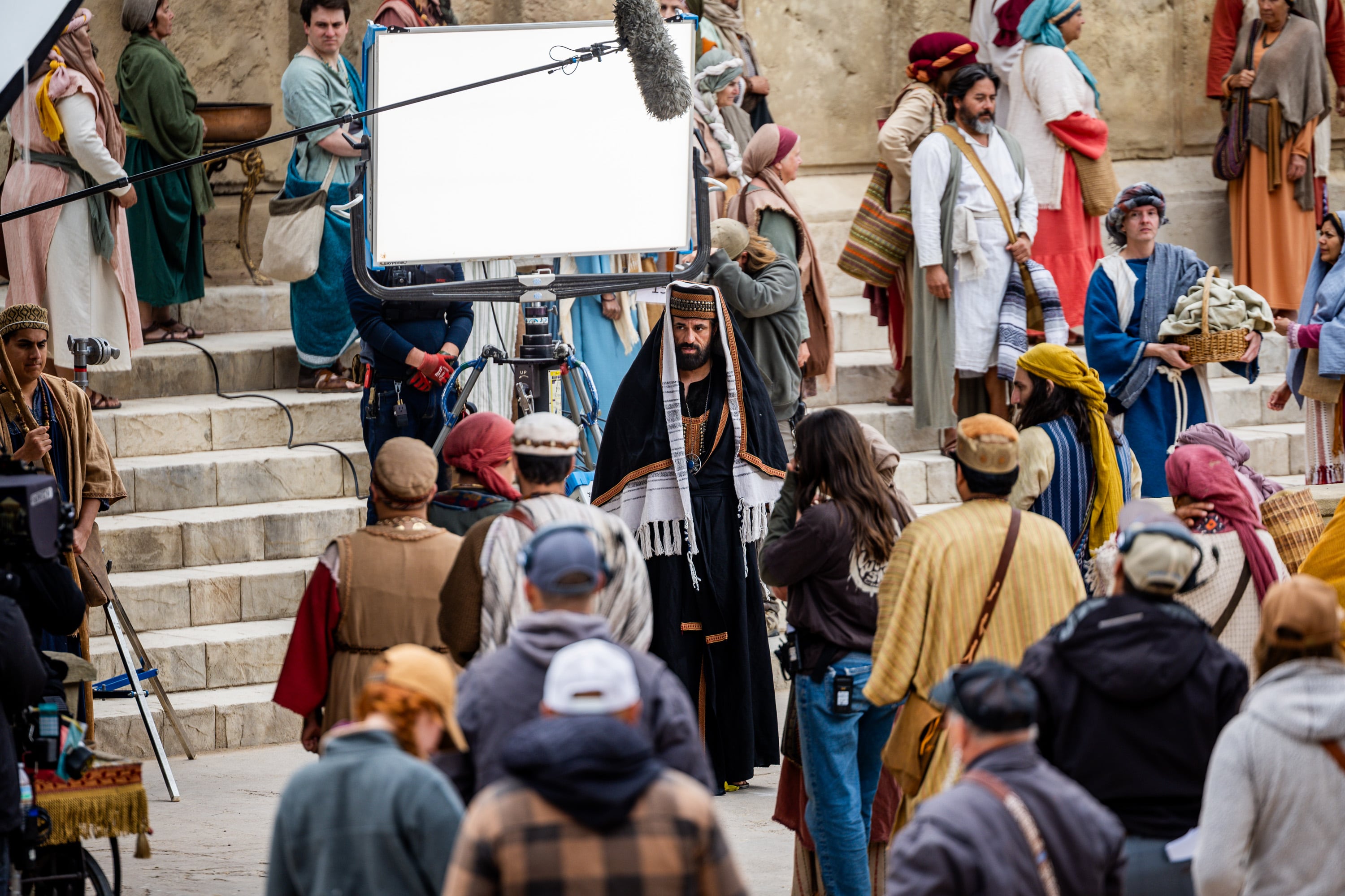 Wasim No’mani, center, acts as Yanni, a Pharisee in Jerusalem, in the Court of Gentiles on the set of "The Chosen" in Goshen, Utah County, on May 14, 2025.