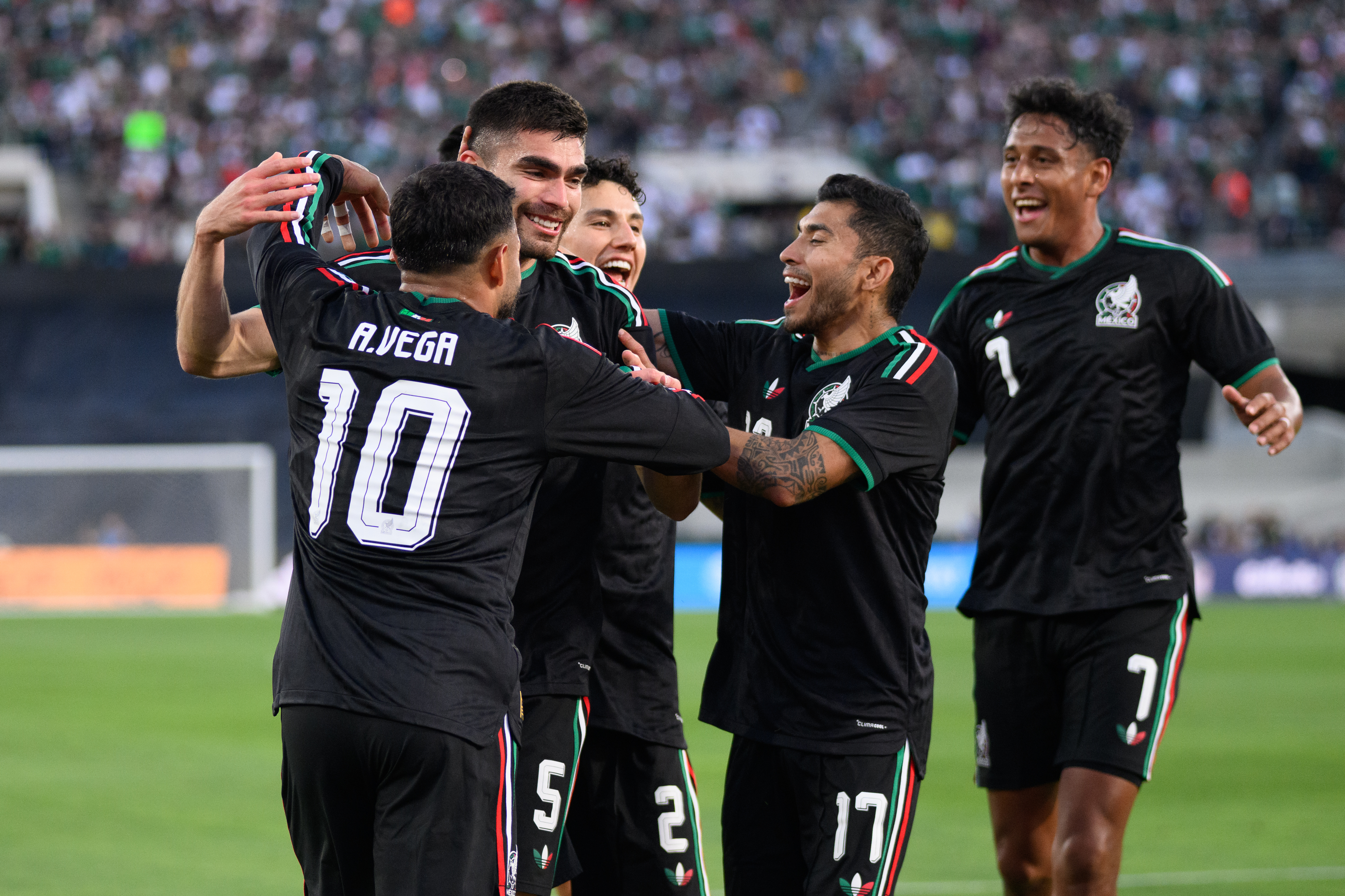 Mexico players celebrate after a goal by Johan Vásquez, second from left, during the first half of an international friendly soccer match against Australia, Saturday, May 30, 2026, in Pasadena, Calif. 