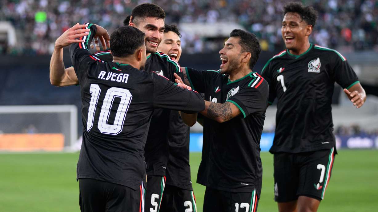 Mexico players celebrate after a goal by Johan Vásquez, second from left, during the first half of an international friendly soccer match against Australia, Saturday, May 30, 2026, in Pasadena, Calif.