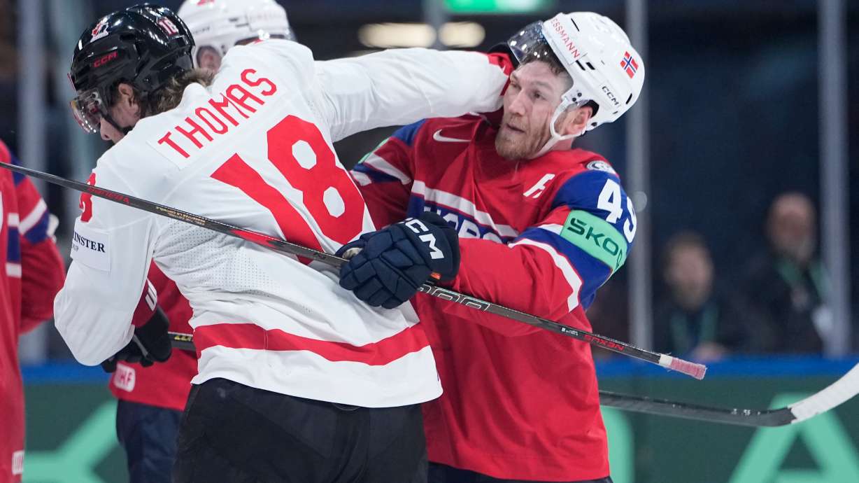 Canada's Robert Thomas (18) clashes with Norway's Christian Kaasastul (49) during the 2026 IIHF Men's Ice Hockey World Championship bronze medal match between Canada and Norway, in Zurich, Switzerland, Sunday, May 31, 2026.