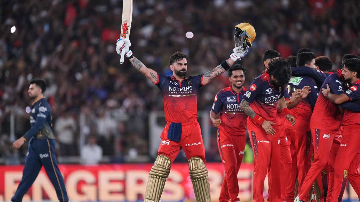 Royal Challengers Bengaluru's Virat Kohli celebrates with teammates after their win in the Indian Premier League final cricket match against Gujarat Titans in Ahmedabad, India, Sunday, May 31, 2026.