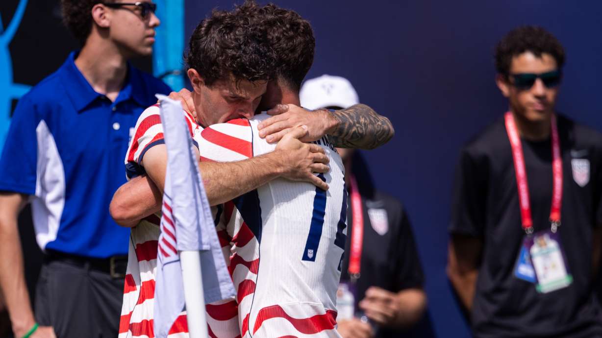 United States forward Christian Pulisic, center left, celebrates with midfielder Sebastian Berhalter (14) after scoring in the first half against Senegal in an international friendly soccer match Sunday, May 31, 2026, in Charlotte, N.C.