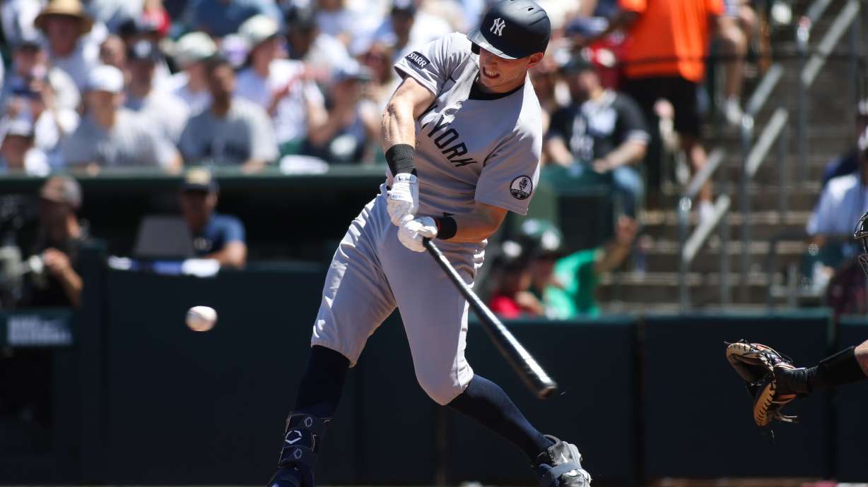 New York Yankees' Ben Rice hits an two-RBI triple during the third inning of a baseball game against the Athletics, Sunday, May 31, 2026, in West Sacramento, Calif.