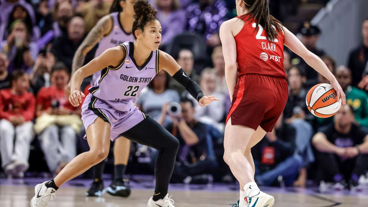 Indiana Fevers' Caitlin Clark (22) drives to the basket against Golden State Valkyries' Veronica Burton (22) during the first half of a WNBA basketball game in San Francisco on Thursday, May 28, 2026.
