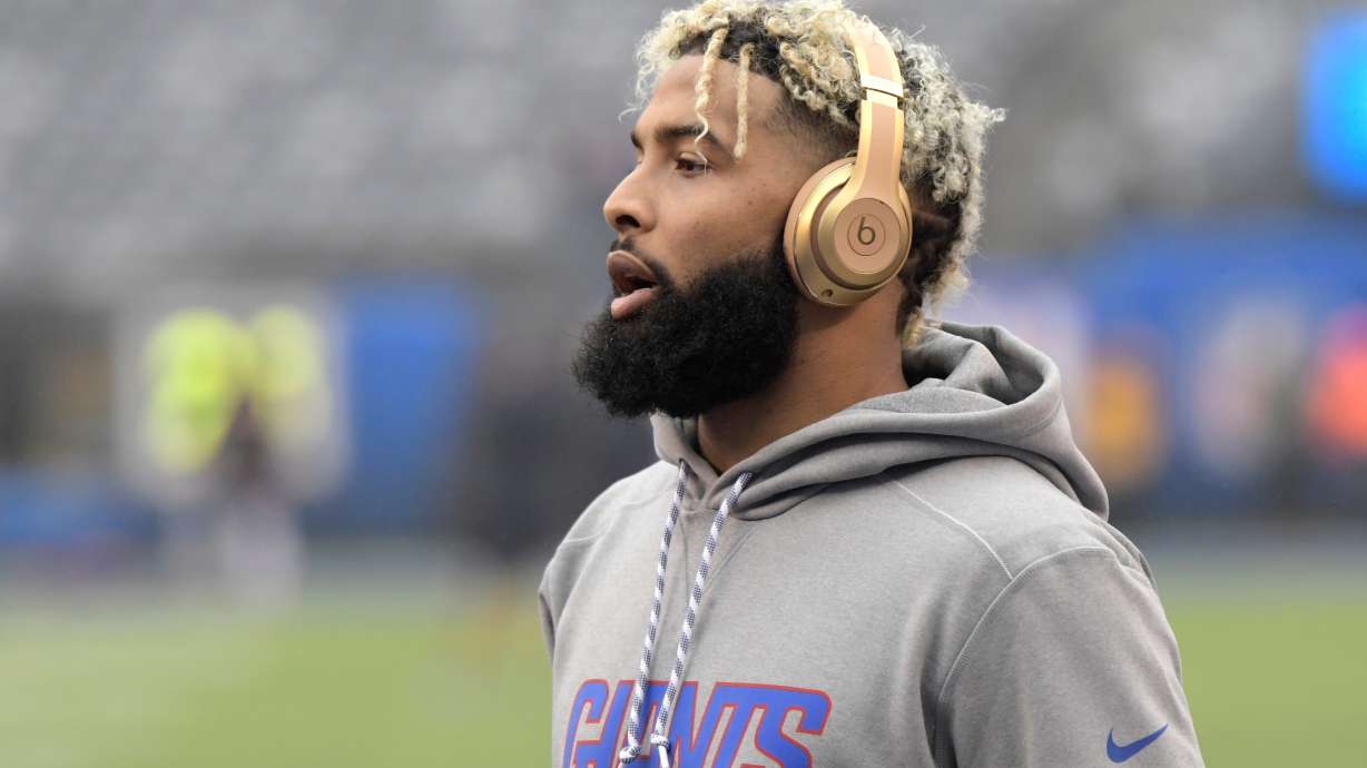 FILE - New York Giants wide receiver Odell Beckham warms up prior to an NFL football game against the Chicago Bears, Dec. 2, 2018, in East Rutherford, N.J.