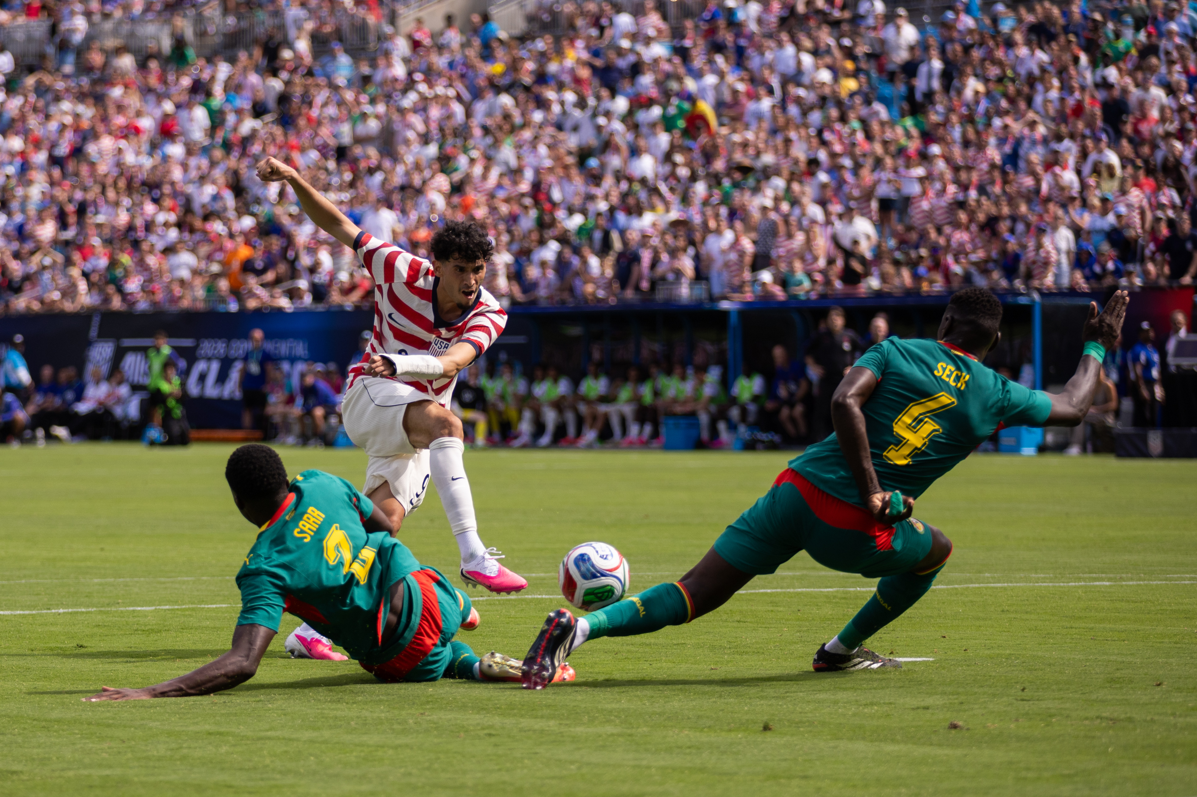 United States forward Ricardo Pepi, top left, has a shot blocked by Senegal defender Abdoulaye Seck (4) during the first half of an international friendly soccer match Sunday, May 31, 2026, in Charlotte, N.C. 