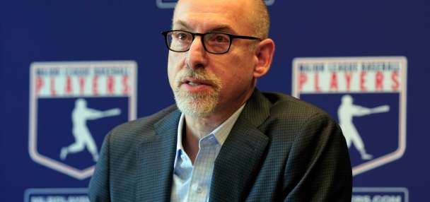 Baseball players' chief says union 'has never been broken' and will fight MLB's salary cap proposal