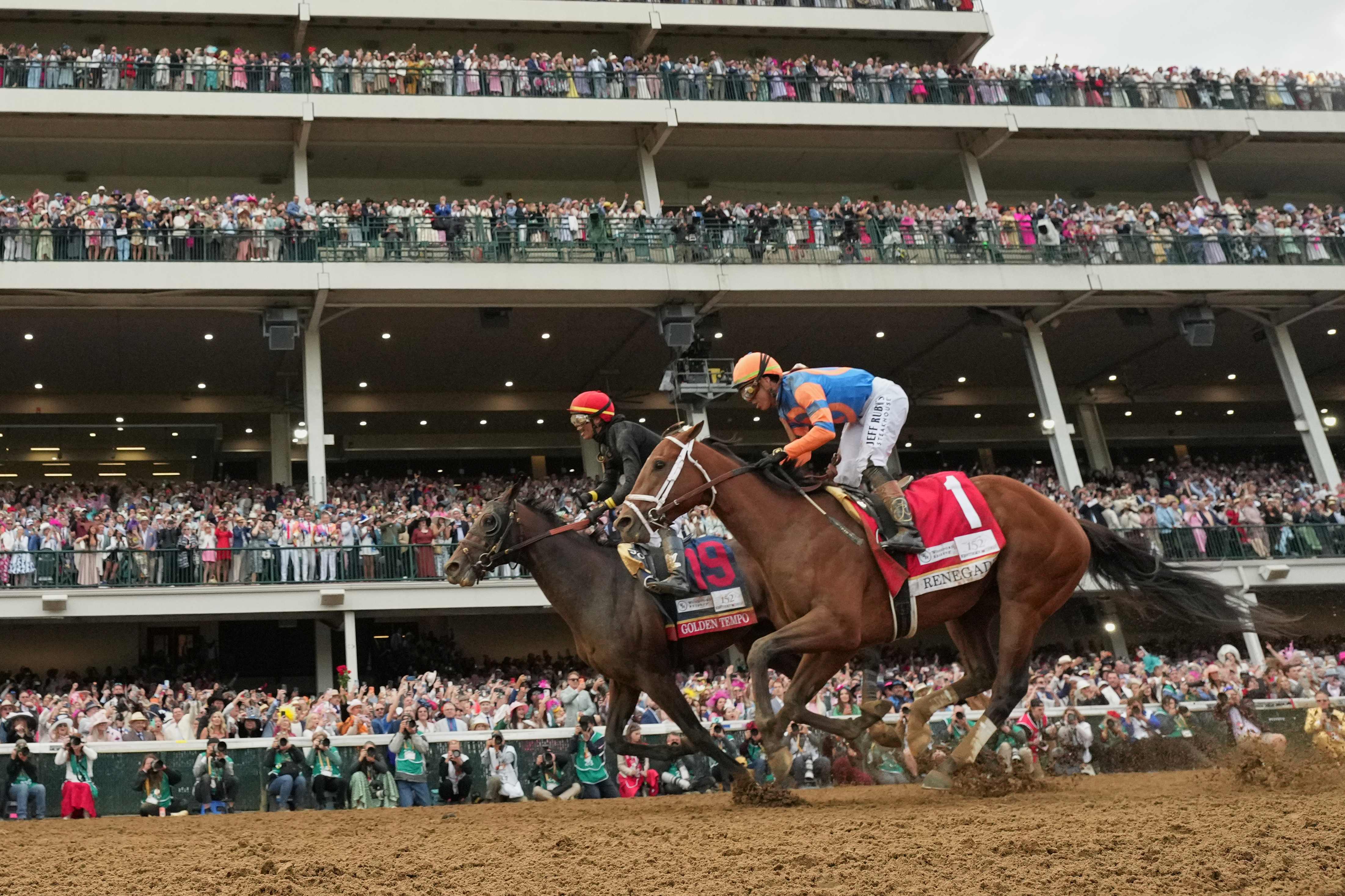 Golden Tempo (19) ridden by Jose L. Ortiz wins the 152nd running of the Kentucky Derby horse race followed by Renegade (1) ridden by Irad Ortiz, Jr., at Churchill Downs, Saturday, May 2, 2026, in Louisville, Ky. 