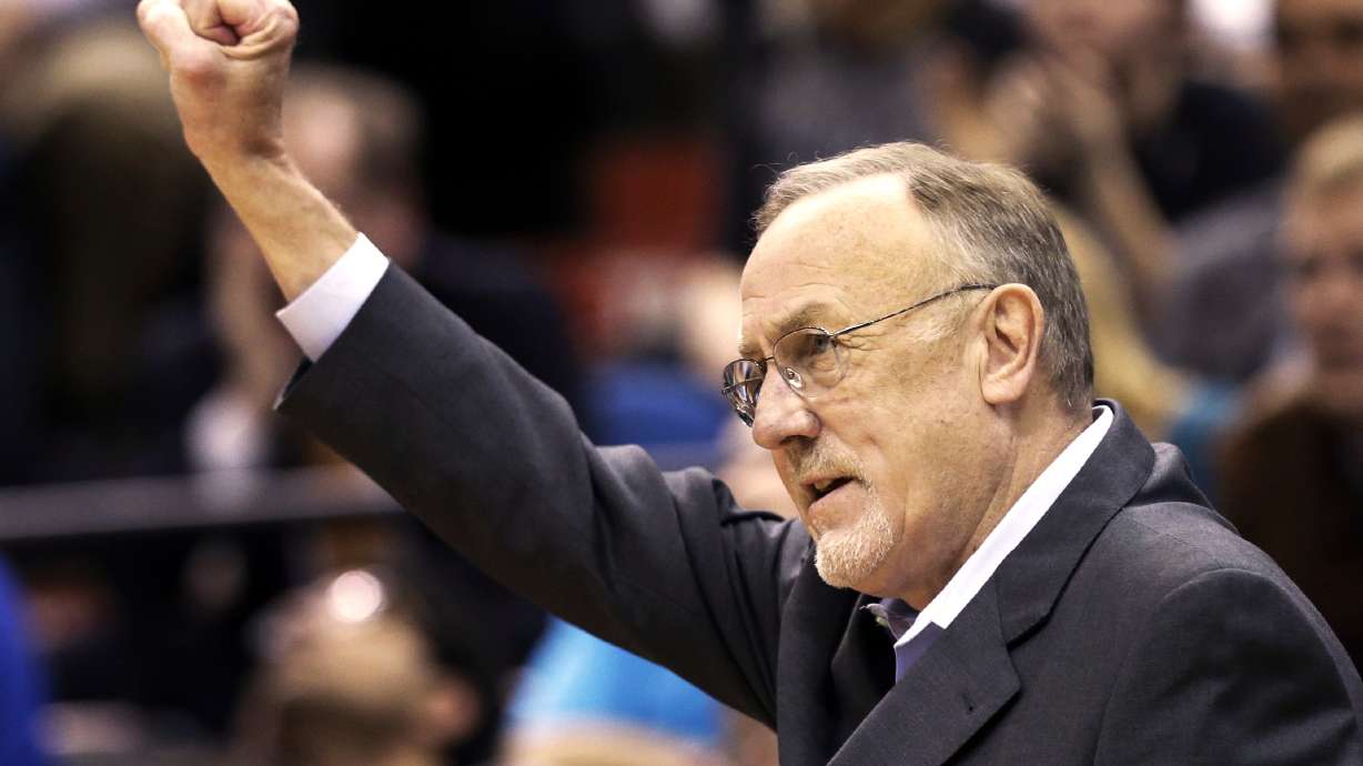 FILE - Minnesota Timberwolves head coach Rick Adelman celebrates a defensive rebound by Ricky Rubio in the second half of an NBA basketball game against Oklahoma City Thunder, March 29, 2013 ,in Minneapolis.