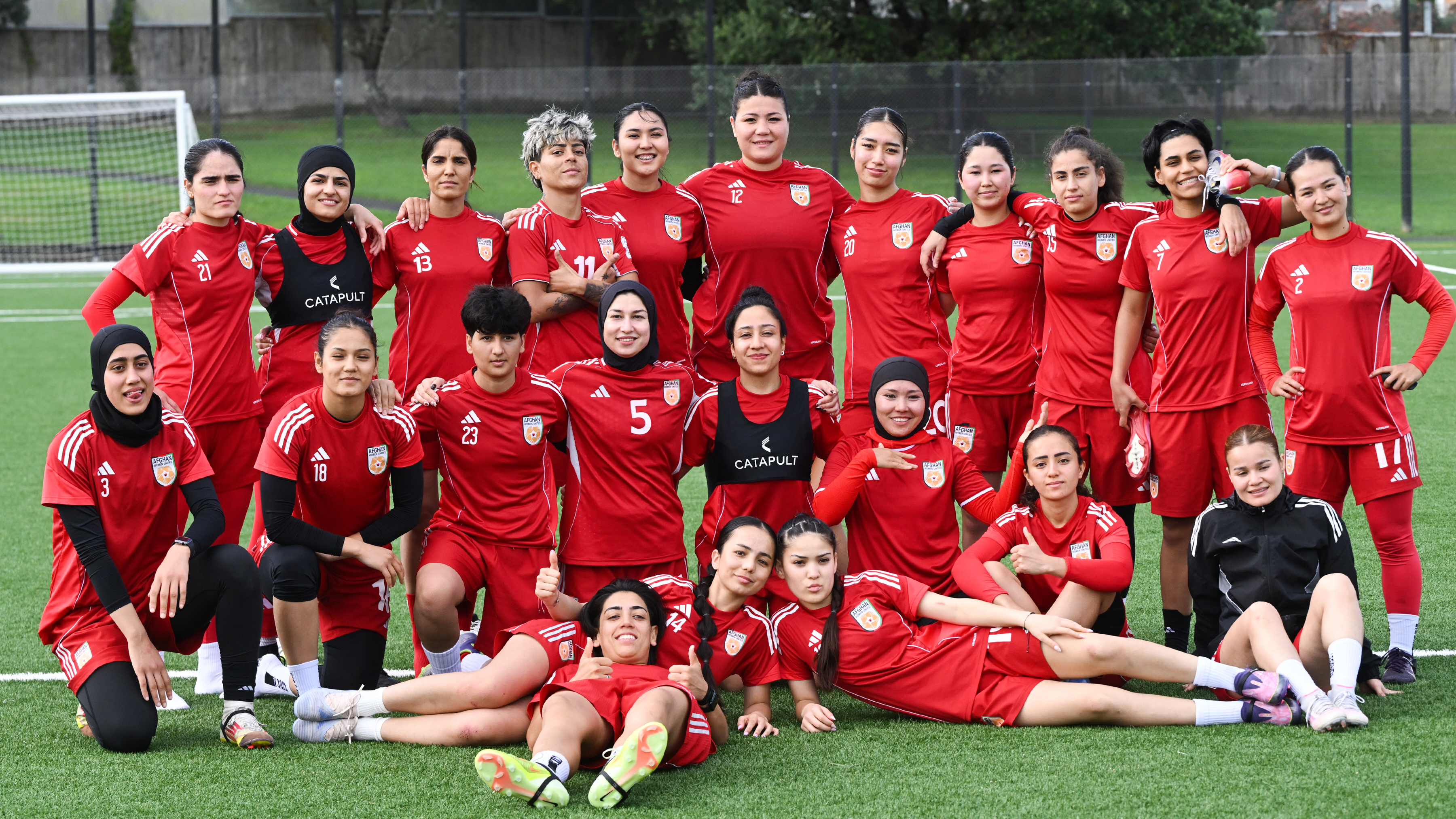 Afghan women's players pose for a team photo during a training session in Auckland, New Zealand, Tuesday, June 2, 2026.