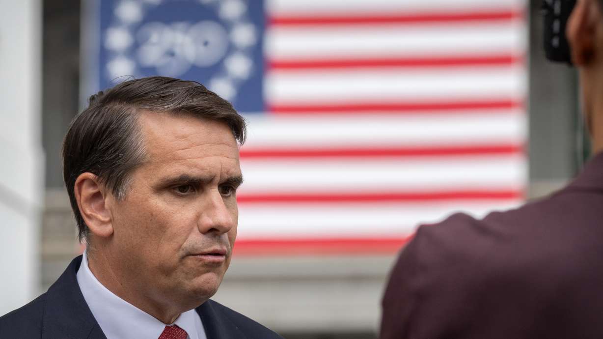 Acting Attorney General Todd Blanche speaks to a reporter outside the White House, Wednesday, in Washington.