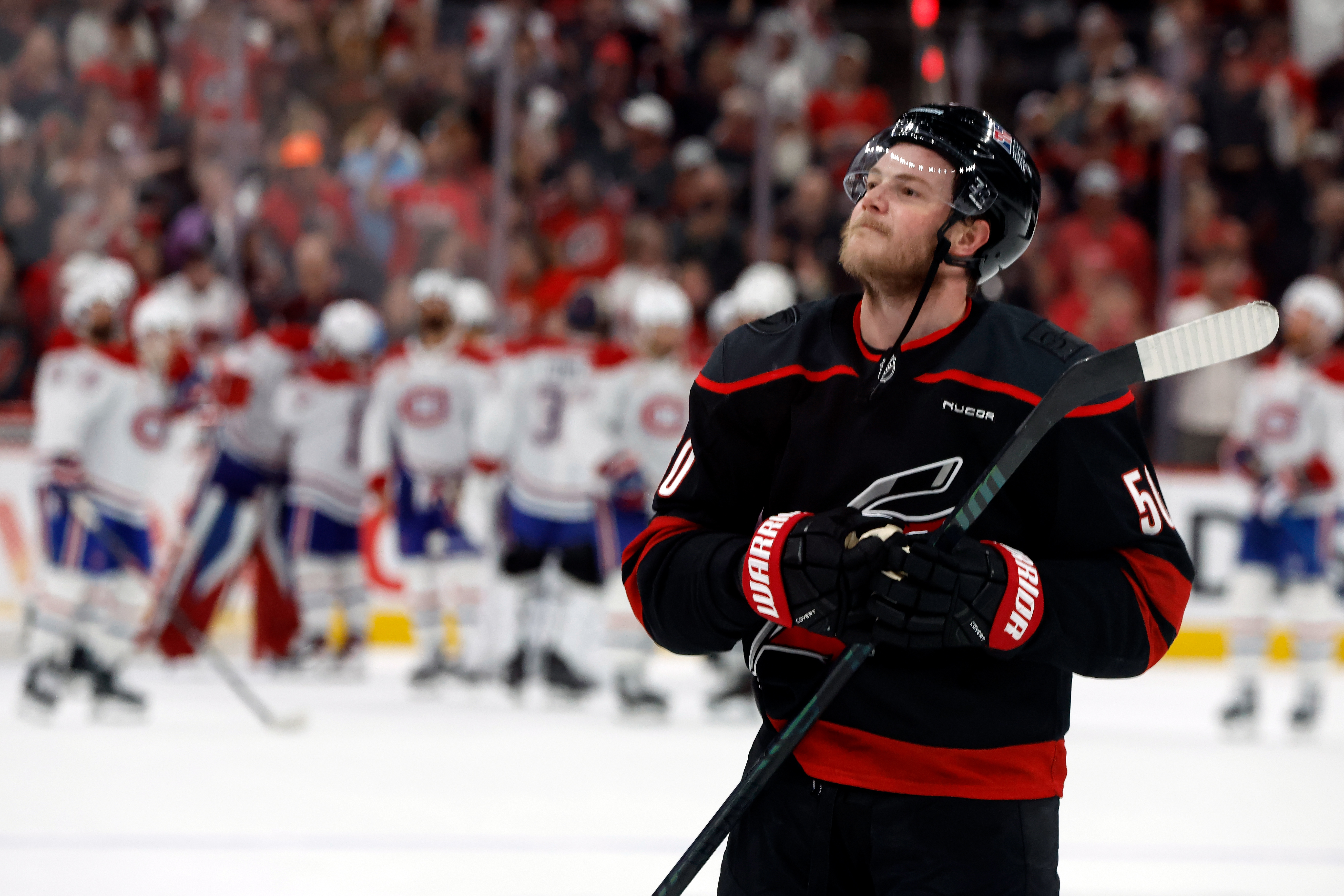 Carolina Hurricanes' Eric Robinson celebrates following Game 5 of the Eastern Conference finals NHL hockey Stanley Cup playoff series against the Montreal Canadiens in Raleigh, N.C., Friday, May 29, 2026. 