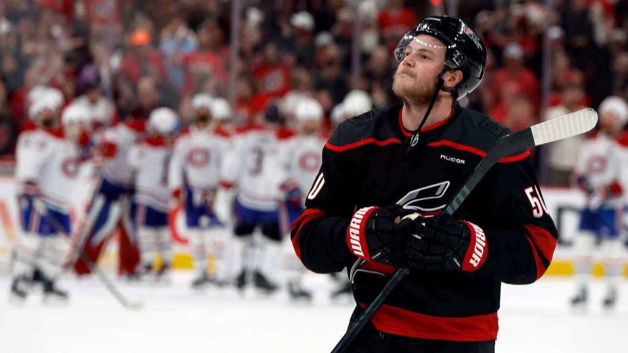 Carolina Hurricanes' Eric Robinson celebrates following Game 5 of the Eastern Conference finals NHL hockey Stanley Cup playoff series against the Montreal Canadiens in Raleigh, N.C., Friday, May 29, 2026.