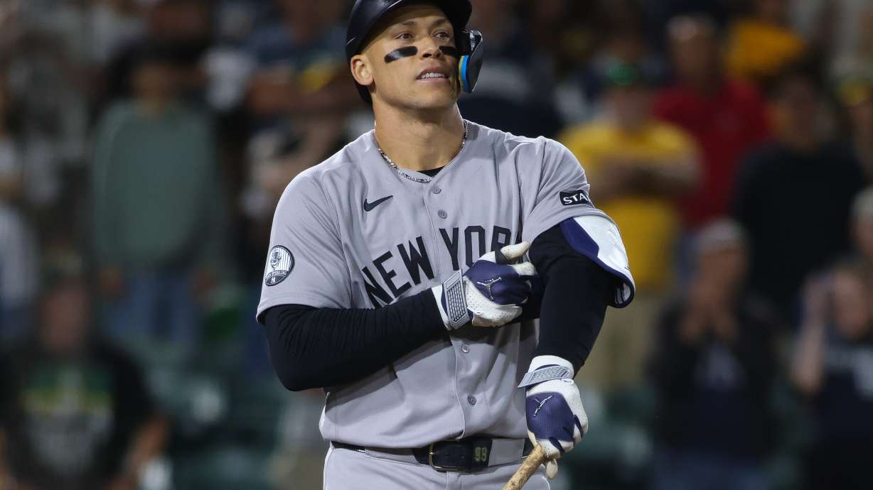 New York Yankees' Aaron Judge reacts after drawing a bases loaded walk to score a run during the ninth inning of a baseball game against the Athletics Saturday, May 30, 2026, in West Sacramento, Calif.