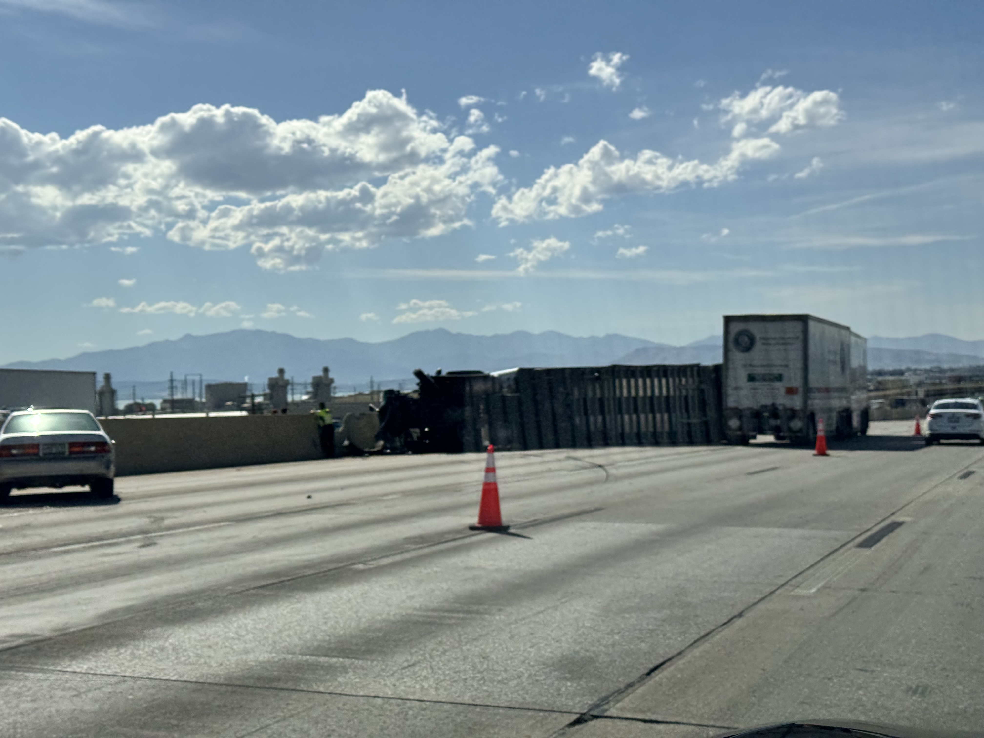 Semitruck crash blocking several lanes, causing significant delays on I-15 in Utah County