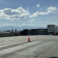 Semitruck crash blocking several lanes, causing significant delays on I-15 in Utah County