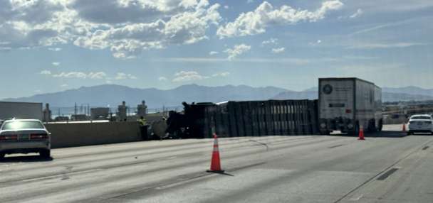 Semitruck crash blocking several lanes, causing significant delays on I-15 in Utah County