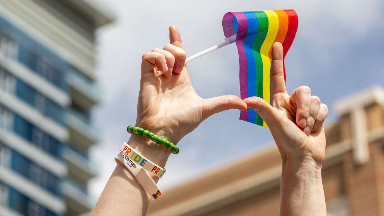 Utahns gather to celebrate Pride Month during the Pride Parade as it passes through downtown in Salt Lake City on June 2, 2024.