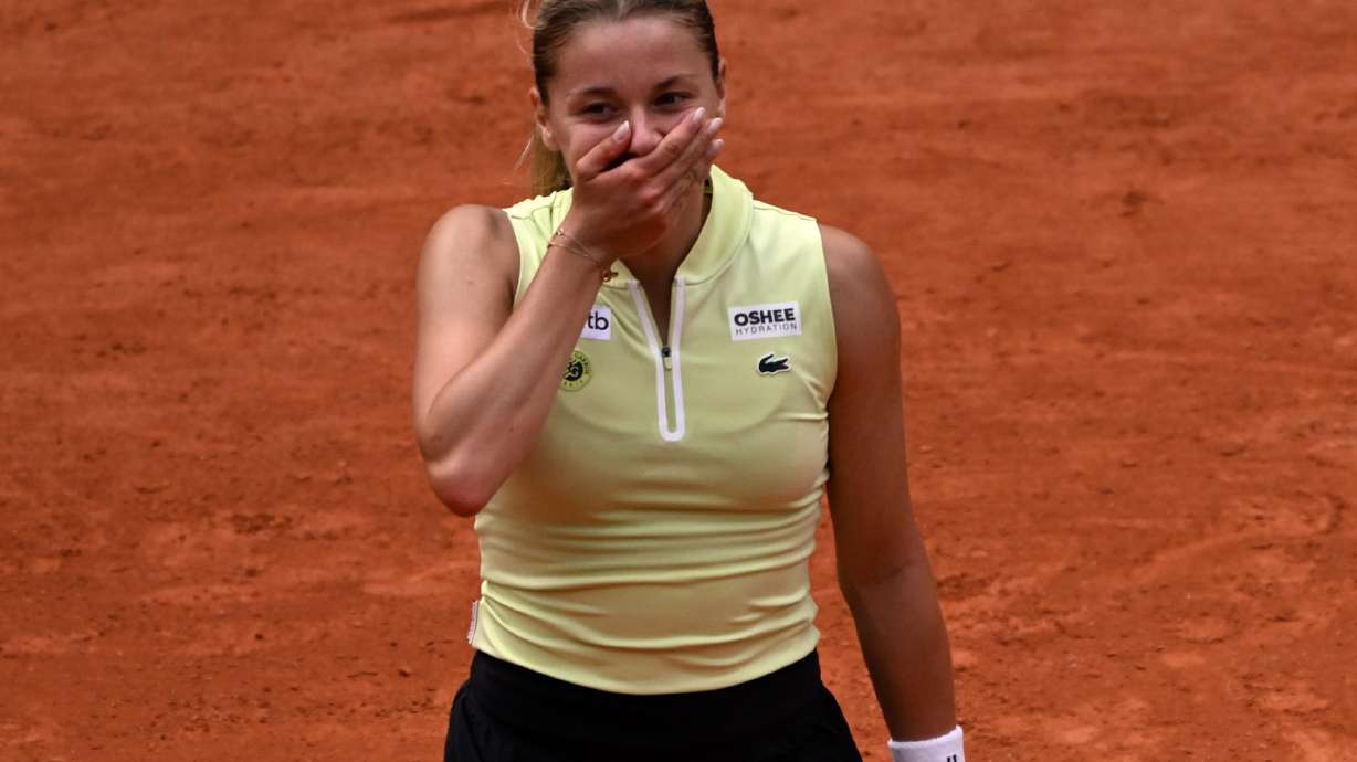 Poland's Maja Chwalinska reacts after winning the quarterfinal tennis match against Russia's Anna Kalinskaya at the French Open in Paris, Wednesday, June 3, 2026.
