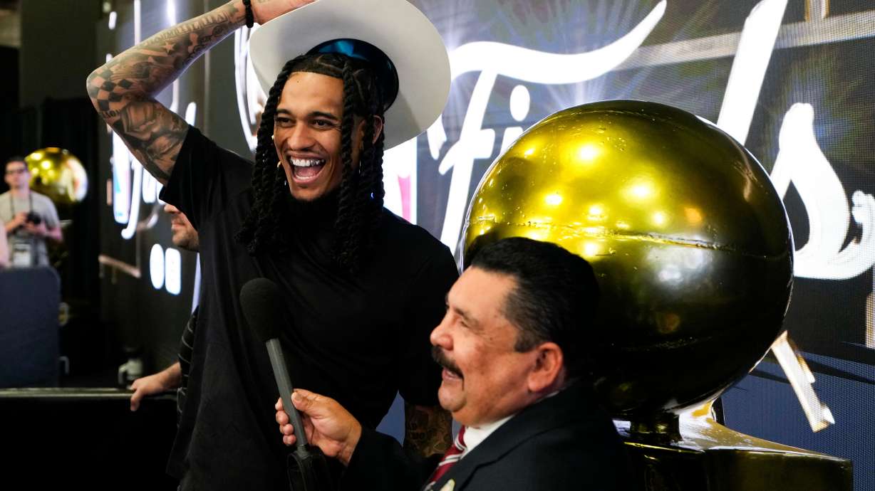 New York Knicks guard Jordan Clarkson laughs with comedian Guillermo Rodriguez before a workout prior to the start of the NBA Finals basketball series against the San Antonio Spurs, Tuesday, June 2, 2026, in San Antonio.