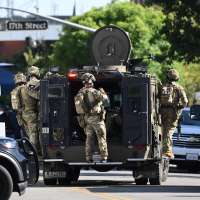 FBI fatally shoots a man holding hostages in a California office building, police say