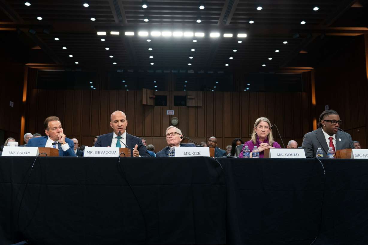 Former Alabama football coach Nick Saban, Notre Dame Director of Athletics Pete Bevacqua, West Virginia University President Gordon Gee, Pac-12 Commissioner Teresa Gould, and University of Utah student athlete Lance Holtzclaw testify before the Senate Committee on Commerce, Science, and Transportation, Wednesday, in Washington. The hearing came as senators consider the Protect College Sports Act.