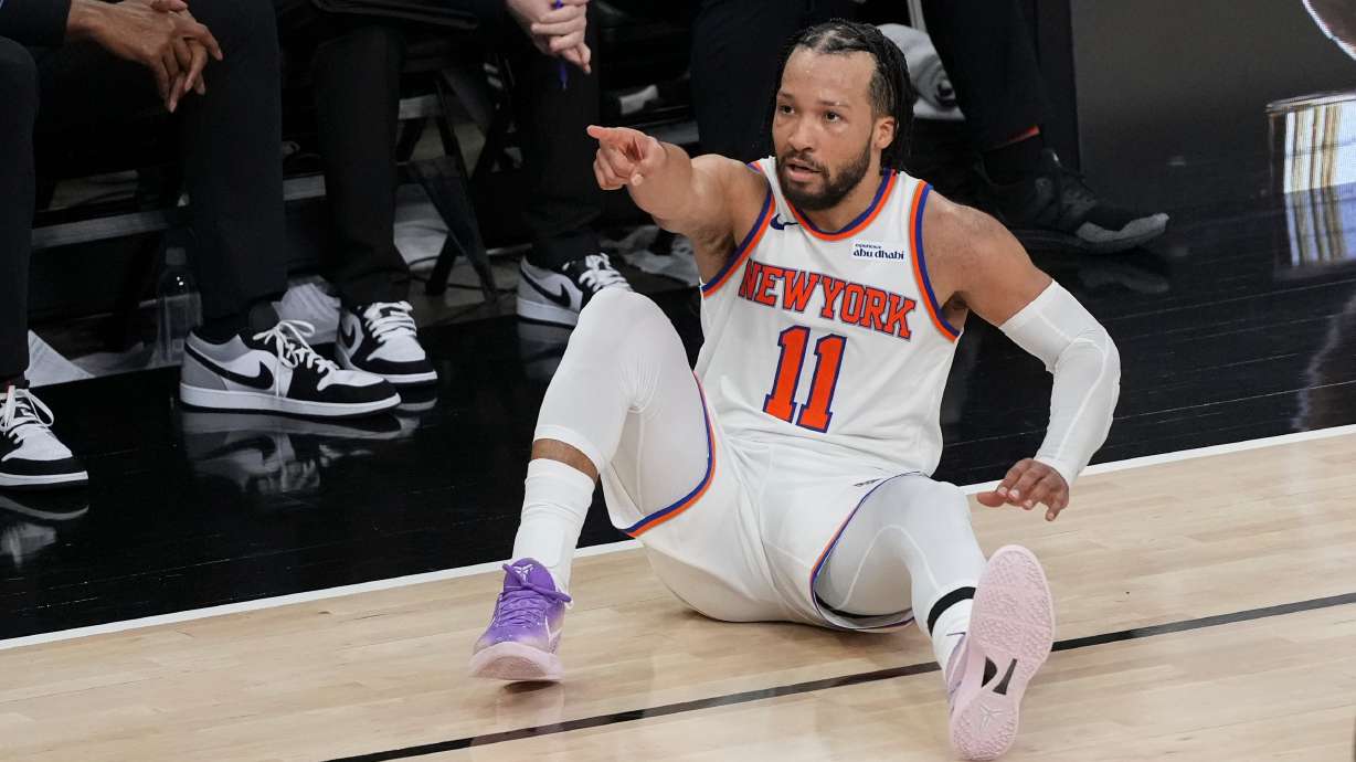 New York Knicks guard Jalen Brunson motion after a basket against the San Antonio Spurs during the second half of Game 1 of the NBA Finals basketball series, Wednesday, June 3, 2026, in San Antonio.