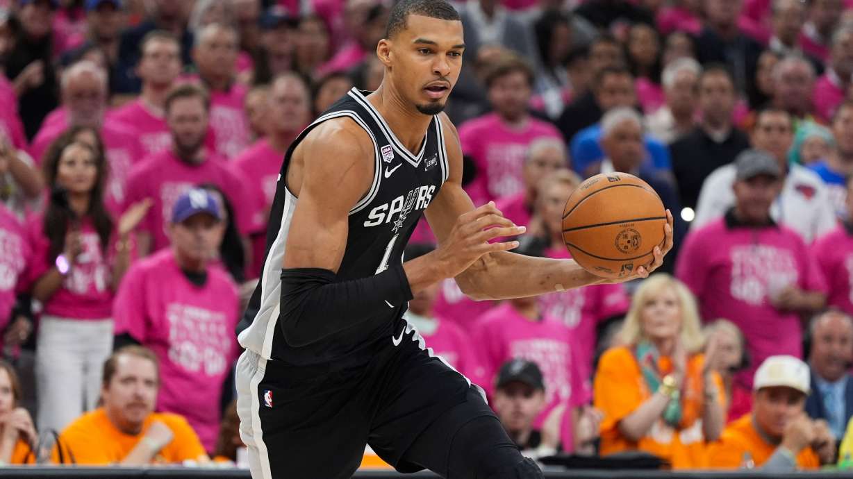 San Antonio Spurs forward Victor Wembanyama (1) drives against the New York Knicks during the first half of Game 1 of the NBA Finals basketball series, Wednesday, June 3, 2026, in San Antonio.