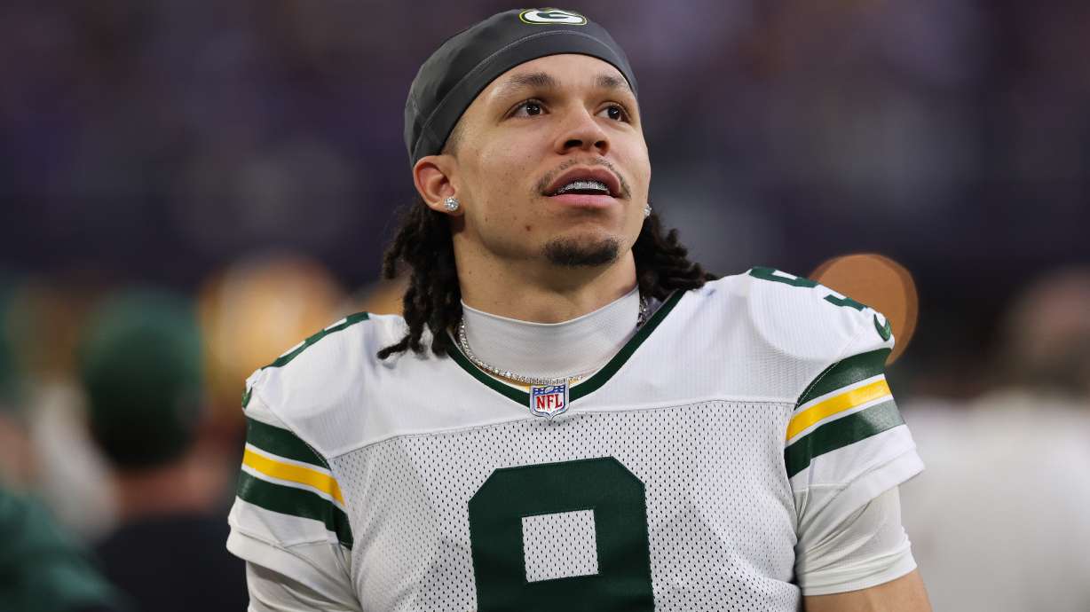 FILE - Green Bay Packers wide receiver Christian Watson looks on during the first half of an NFL football game against the Minnesota Vikings, Jan. 4, 2026 in Minneapolis.