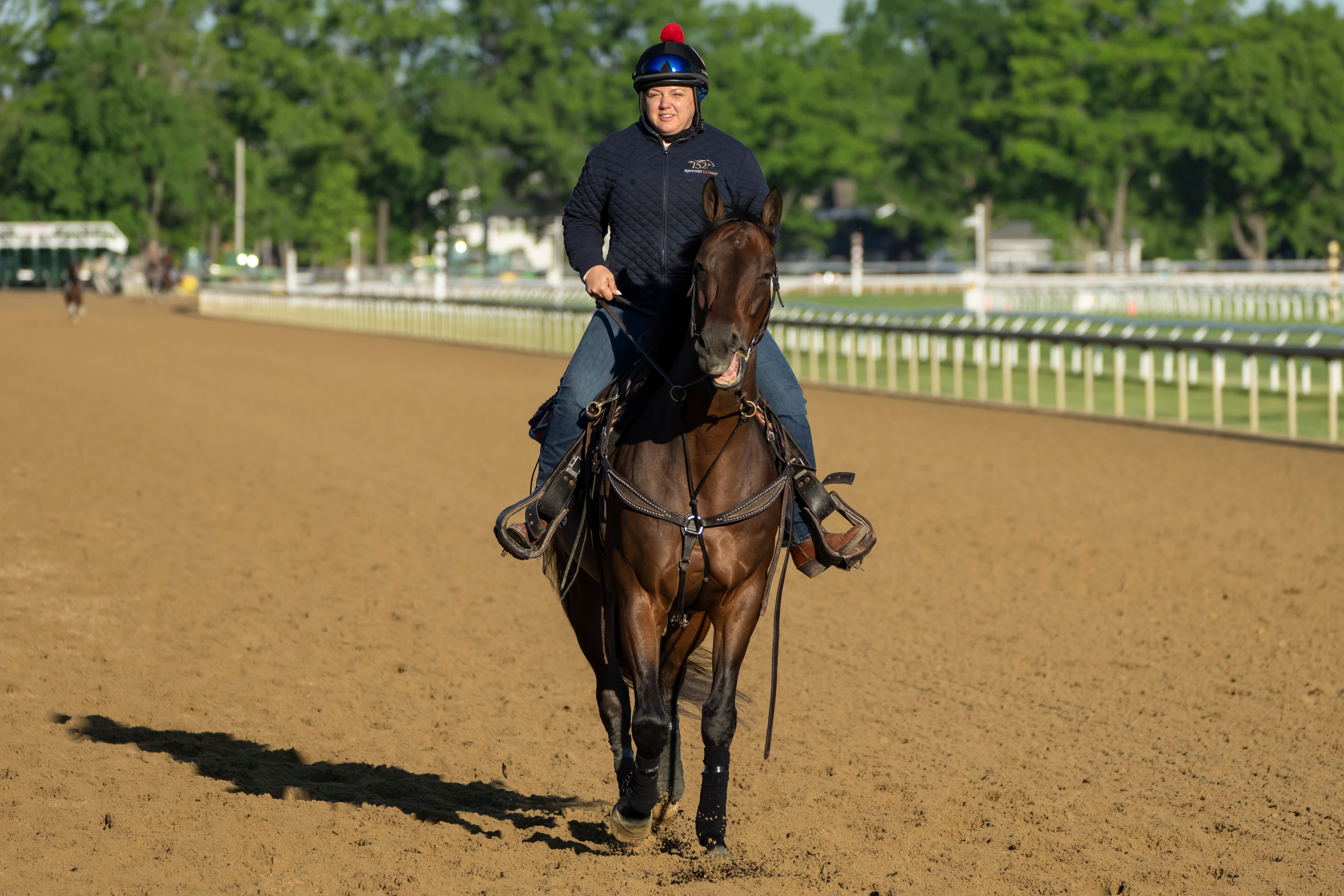 Cherie DeVaux, trainer of Kentucky Derby winner and Belmont Stakes entrant Golden Tempo, rides on a horse ahead of the 158th running of the Belmont Stakes horse race at Saratoga Race Course, Thursday, June 4, 2026, in Saratoga Springs, N.Y. 