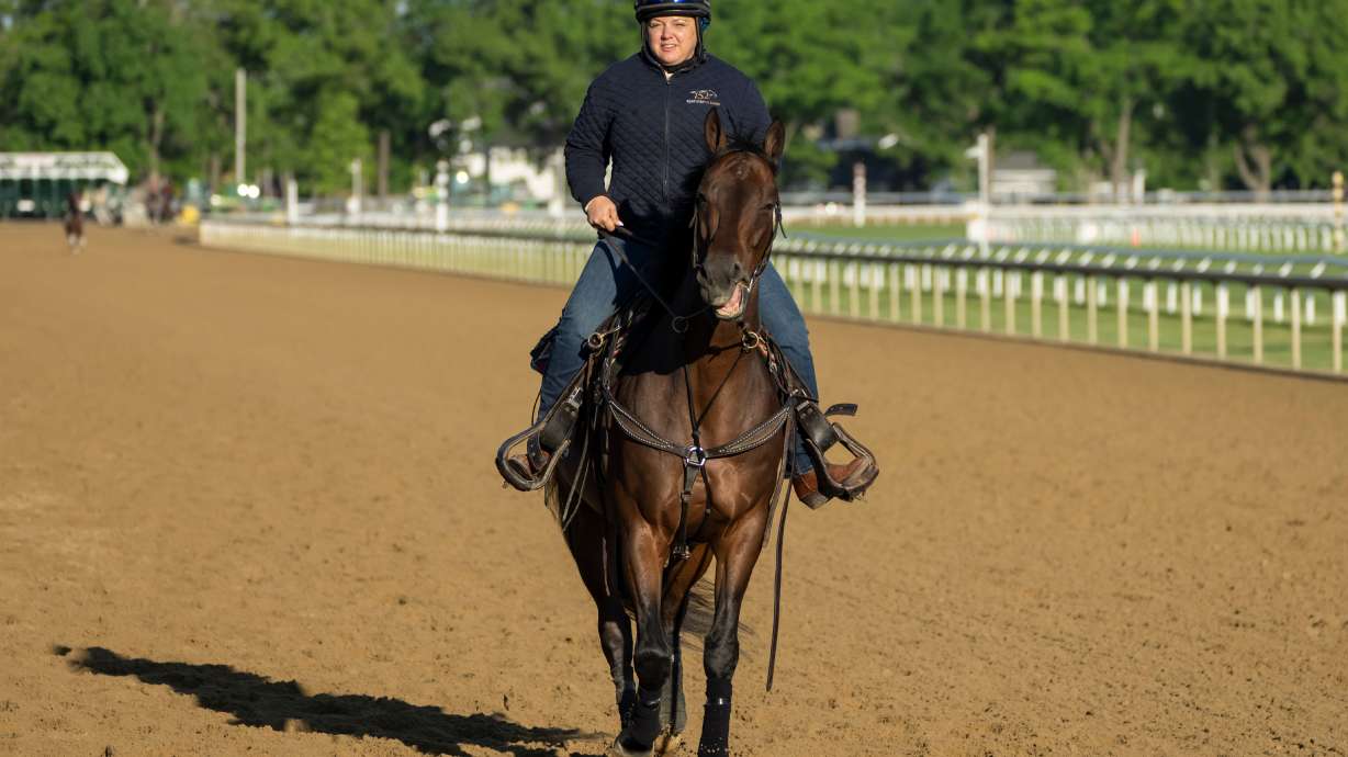 Cherie DeVaux, trainer of Kentucky Derby winner and Belmont Stakes entrant Golden Tempo, rides on a horse ahead of the 158th running of the Belmont Stakes horse race at Saratoga Race Course, Thursday, June 4, 2026, in Saratoga Springs, N.Y.