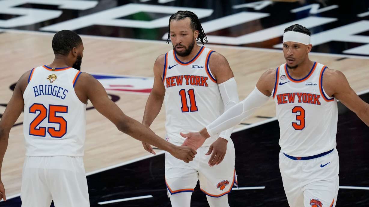 New York Knicks guard Josh Hart (3) greets guard Mikal Bridges (25) during the second half of Game 1 of the NBA Finals basketball series against the San Antonio Spurs, Wednesday, June 3, 2026, in San Antonio.