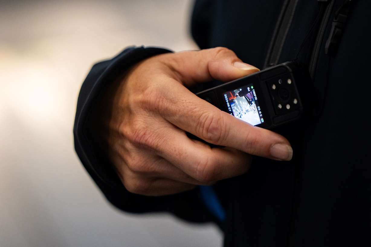 Jeanette Lee, co-founder and chief commercial officer of Bringit, wears a video camera for transparency as she picks up luggage for a customer at Salt Lake City International Airport on Wednesday. Bringit is a company that provides an on-demand, same-day luggage delivery to hotels, rentals and residences in Salt Lake City and Park City.