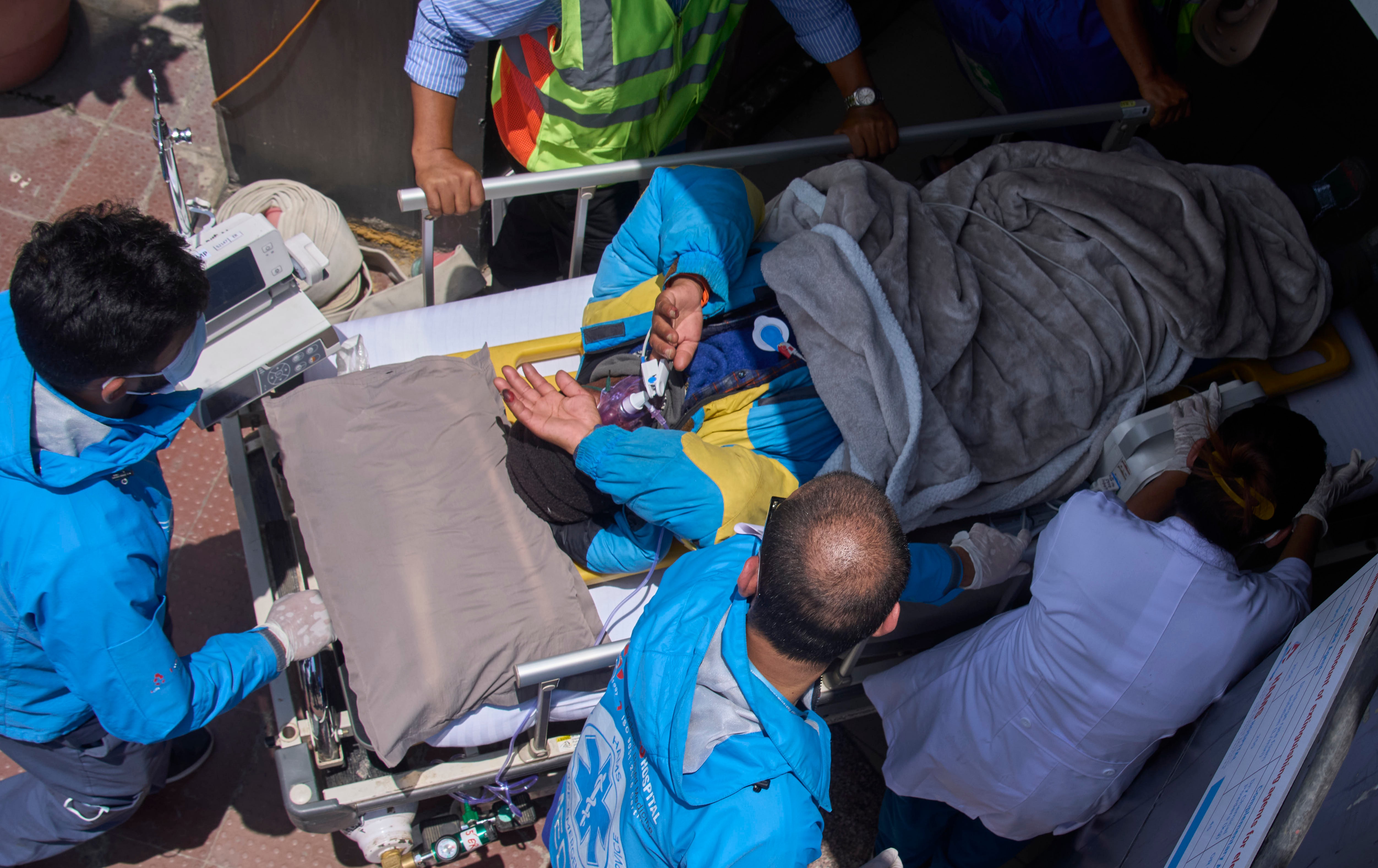 Family questions rescue efforts for Sherpa guide found alive on Everest