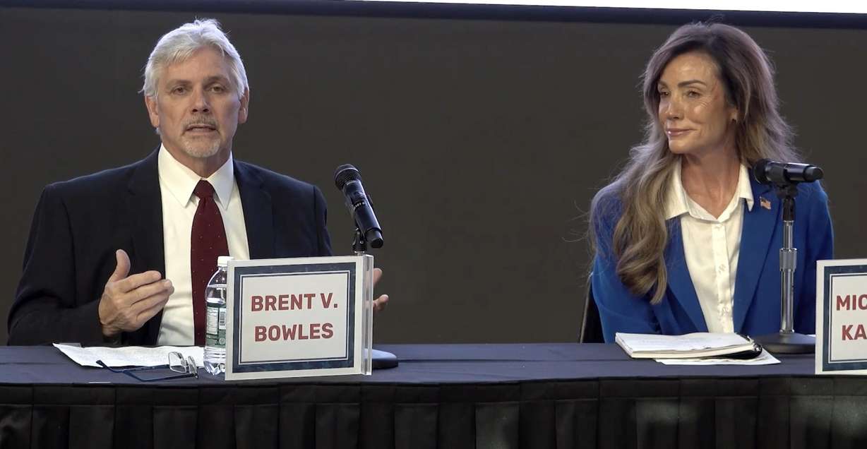 Utah County Commission candidates Brent Bowles and Michelle Kaufusi speak during a debate by the Utah Valley Chamber of Commerce on May 7.