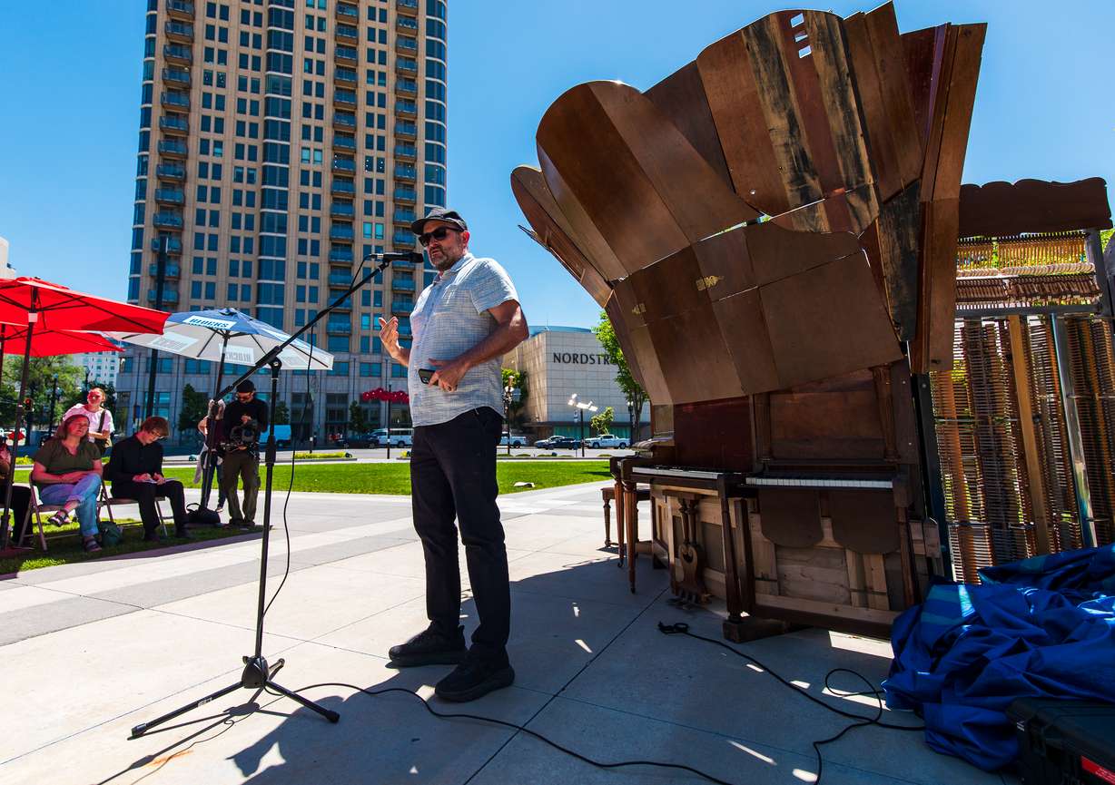 Utah artist Jason Manley speaks about his piece for "Key Changes" at an unveiling event in Salt Lake City on Friday, June 5, 2026.