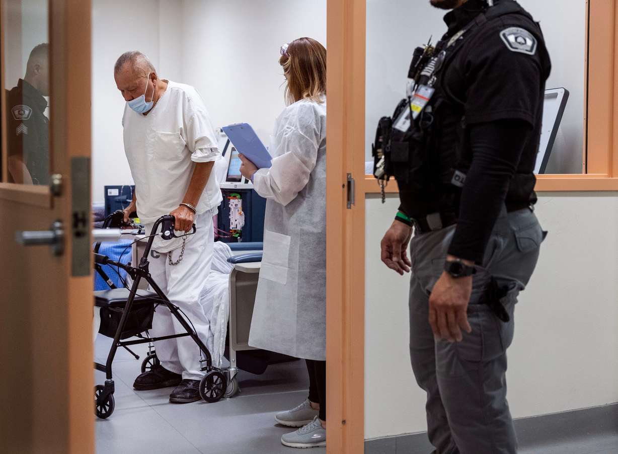 John Oliva stands after a three-hour dialysis treatment at the Utah State Correctional Facility in Salt Lake City on Wednesday. Oliva said the in-house treatment options saved his life.
