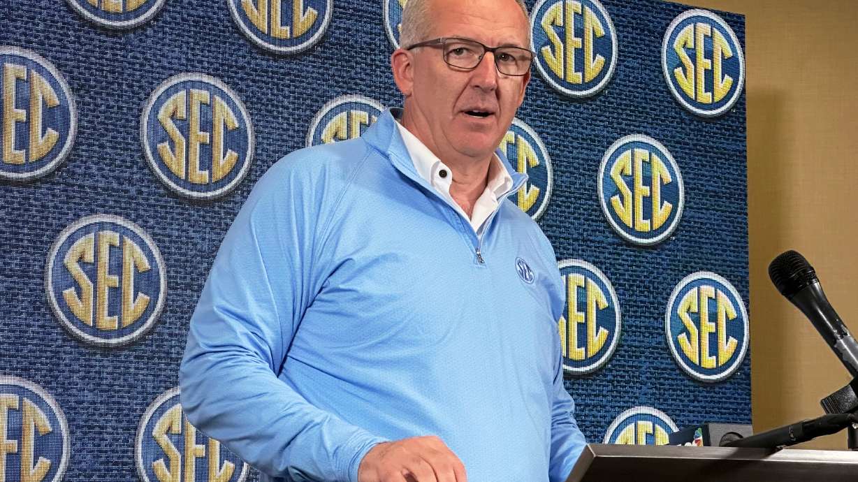 FILE - Southeastern Conference Commissioner Greg Sankey speaks to reporters during the conference's spring meetings, May 30, 2023, in Destin, Fla.